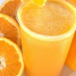 Стакан сока с апельсином